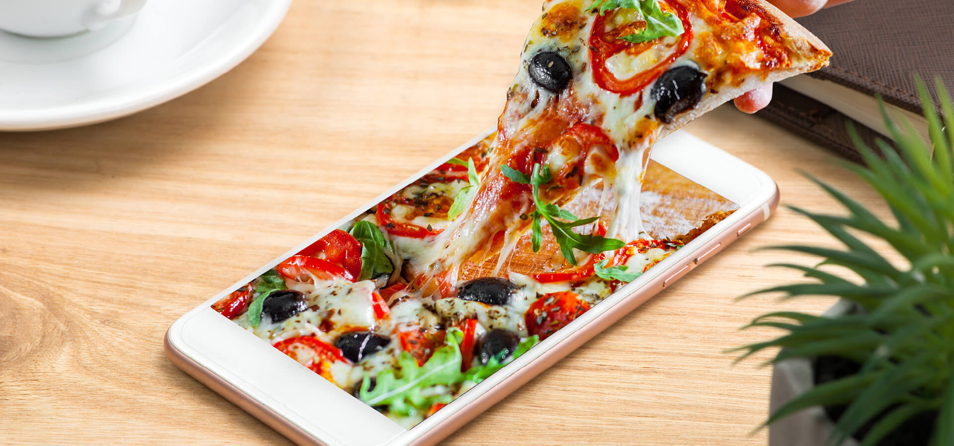 Bild von einem Smartphone mit Pizza